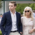 Caroline Poulter attending an outdoor event with her son Will Poulter