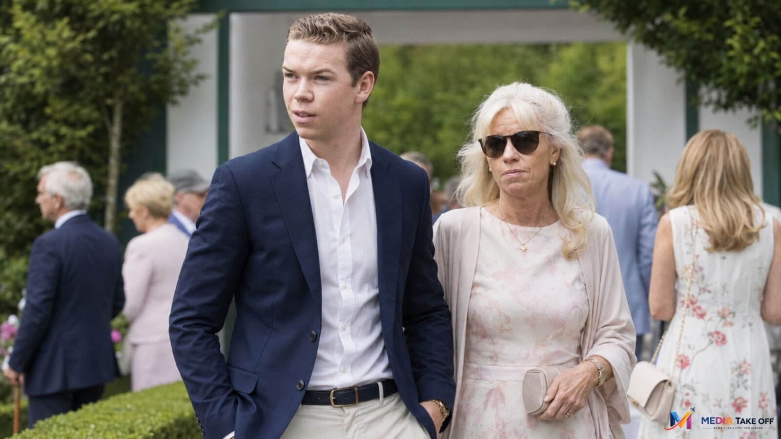 Caroline Poulter attending an outdoor event with her son Will Poulter