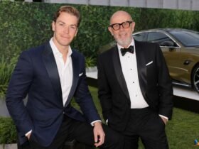 Neil Poulter with his son Will Poulter at a formal event.